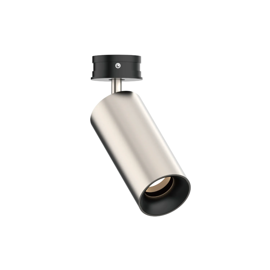 Black ceiling mount with a silver cylindrical track light hanging from a rod, angled downward
