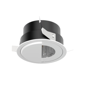 110-01 | DuraGreen Close-up of a ceiling-mounted metal device with a curved dark housing, a white circular outer rim, and a central vertical metal blade protruding upward.