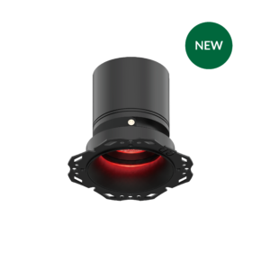 Close-up of a dark cylindrical device with a red glowing lens at the base and a green circular 'NEW' badge in the top-right corner.