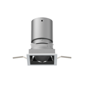 Tall metallic cylindrical device against a black background, featuring a small circular sensor and a square front panel—likely a ceiling-mounted sensor or projector housing.