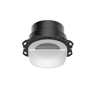 Close-up of a modern outdoor LED light fixture with a black cylindrical shade and white housing.