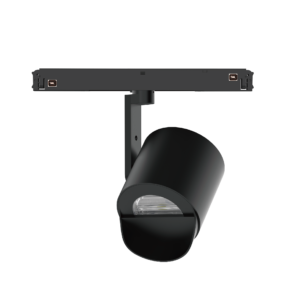 Side view of a dark grey, rectangular LED track-light fixture mounted on a vertical stand, featuring a cylindrical end light housing at the bottom right and copper-colored connectors on the sides.